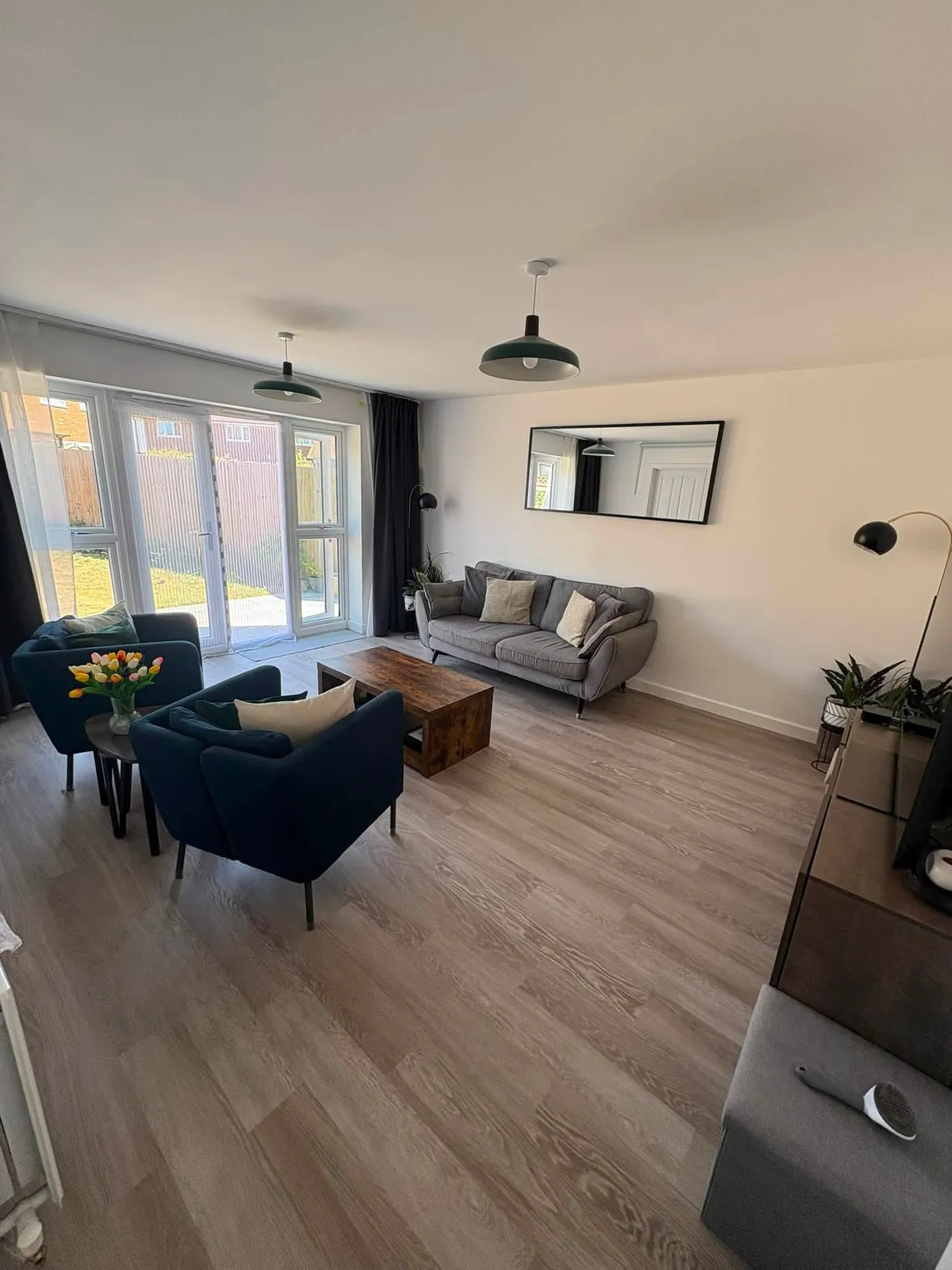 Bright, freshly cleaned open plan living room in a Horley home
